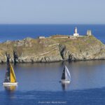 Grand Soleil 80 LC Bianca II îl urmează pe Wally 60 Wallyño al lui Benoît de Froidmont pe lângă stânca Giraglia. Foto: Loro Piana/Studio Borlenghi